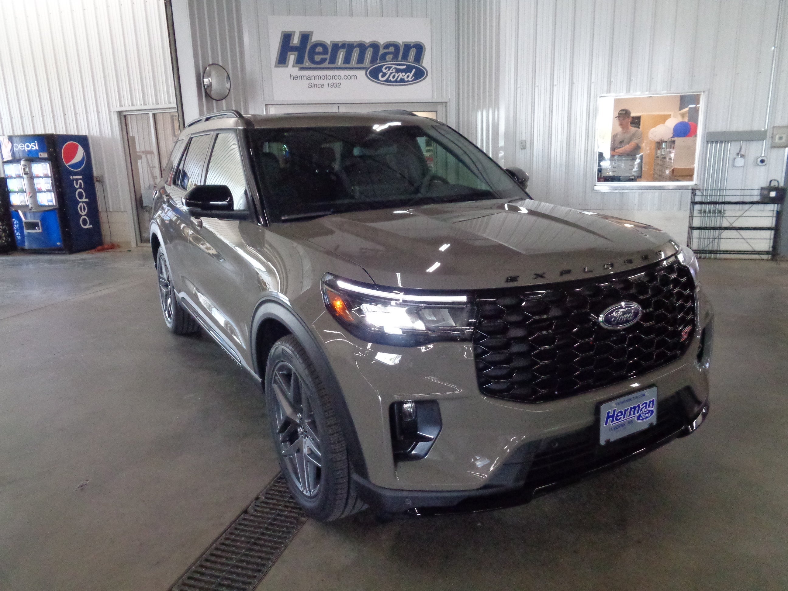 2026 Ford Explorer ST in Marsh Gray — front three-quarter view